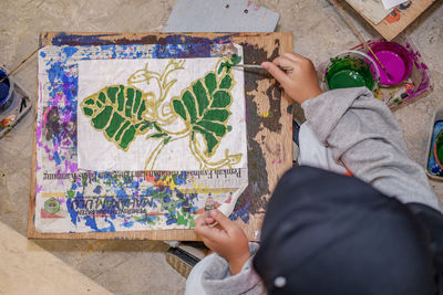 Batik is an indonesian technique of wax-resist dyeing applied to the whole cloth