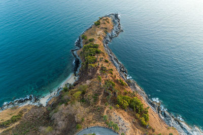 Aerial view of cliff by sea