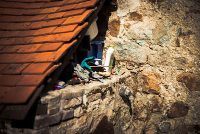 Low angle view of weathered wall of building