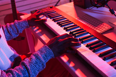 High angle view of people at piano