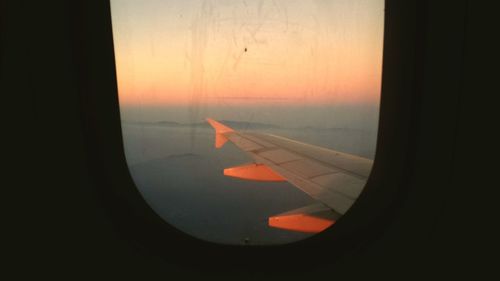 Cropped image of airplane wing