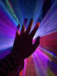Close-up of person hand holding illuminated light