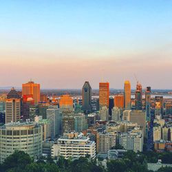 Cityscape against sky during sunset