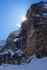 Scenic view of mountain against clear sky during winter