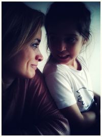 Close-up portrait of a smiling young woman