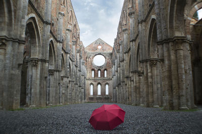 Umbrella against historical building