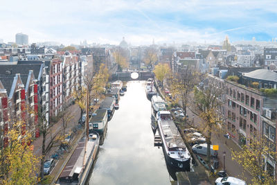 High angle view of street amidst buildings in city