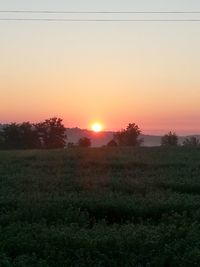 Scenic view of landscape at sunset