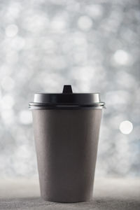 Close-up of coffee cup on table