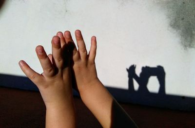 Low section of baby feet