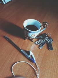 High angle view of coffee cup on table