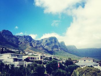 Mountain range against cloudy sky