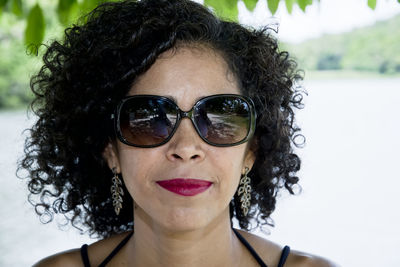 Portrait of young woman wearing sunglasses