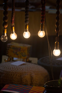 Close-up of illuminated light bulb