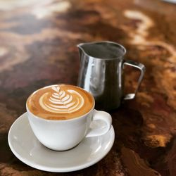 Coffee cup on table