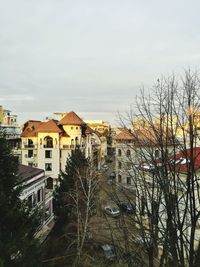 High angle view of houses and buildings against sky