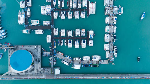 High angle view of information sign against blue sea