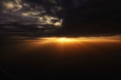 Scenic view of dramatic sky during sunset