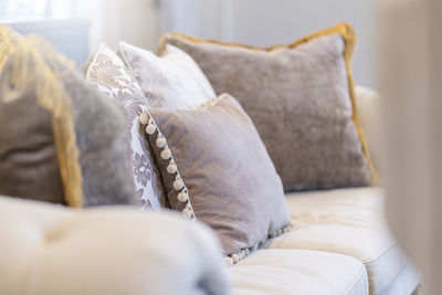 Close-up of empty seats on sofa