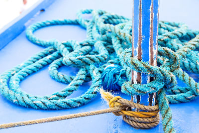 Close-up of rope tied on metal