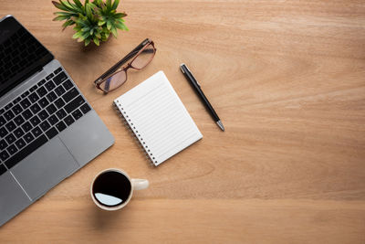 High angle view of coffee cup on table