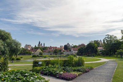 View of garden with buildings in background