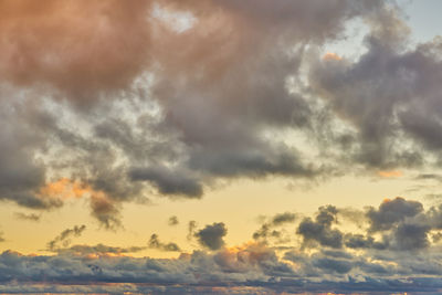 Low angle view of dramatic sky during sunset