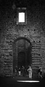 Silhouette of woman in old building