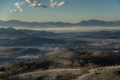 Scenic view of landscape against sky during sunset