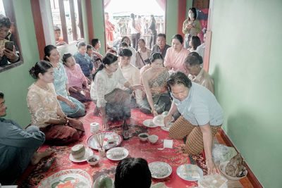 High angle view of people on table