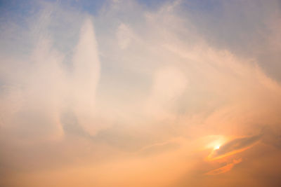 Low angle view of dramatic sky during sunset