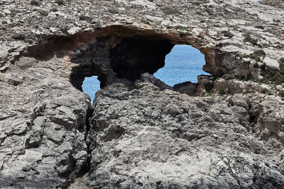 Man standing on rock formation