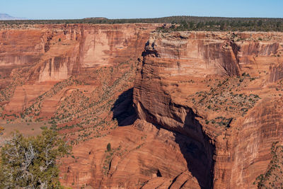 Red colored stone canyon and buttes at canyon de chelly national monument in arizona
