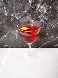 Close-up of cocktail in glass on table