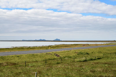 Scenic view of land against sky