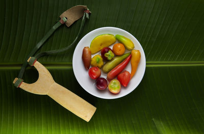 Close-up of fruits and vegetables on plate