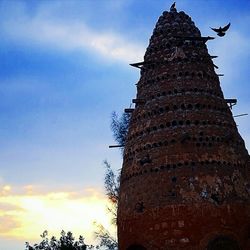 Low angle view of tower against sky