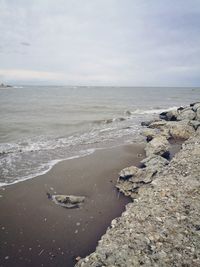 Scenic view of beach against sky