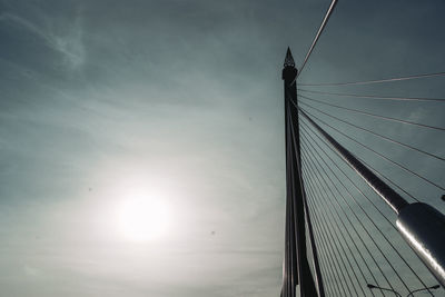 Low angle view of bridge against sky during sunset