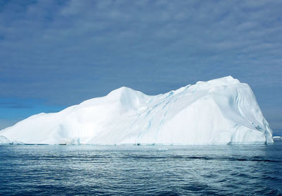 Scenic view of frozen sea against sky