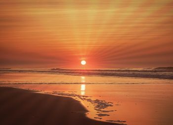 View of calm sea at sunset