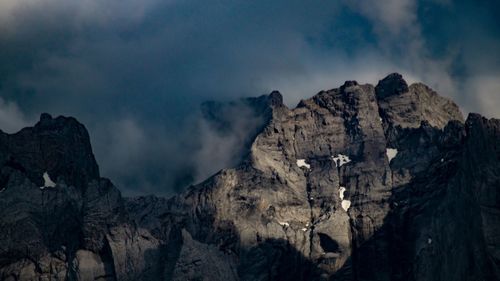 Panoramic view of rocky mountains against sky