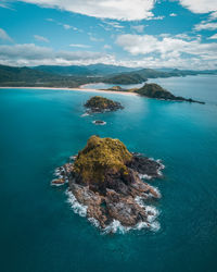 Aerial view of island against sky