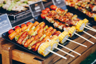 High angle view of meat on barbecue grill