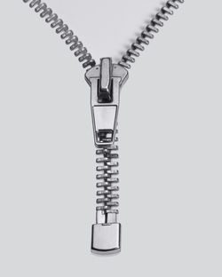 Low angle view of chain against white background