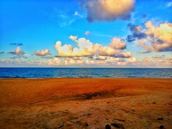 Scenic view of beach against sky