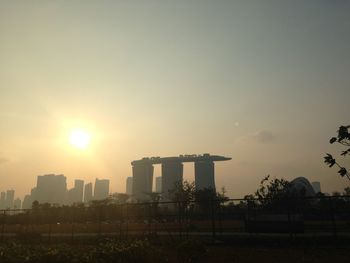 View of buildings at sunset