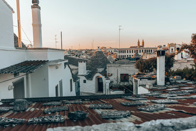 High angle view of buildings against sky during sunset