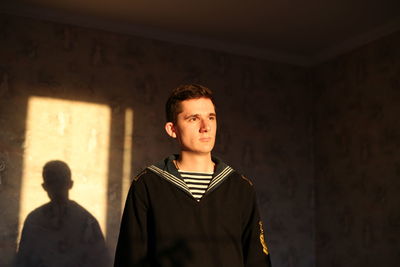 A young cadet in a naval uniform. portrait. sailor. high quality photo