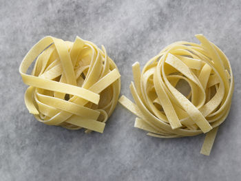 High angle view of tagliatelle pasta on table